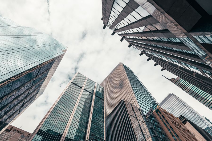 A view of tall buildings in a city.